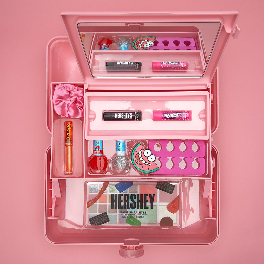 pink kit filled with an assortment of hersheys licensed makeup products